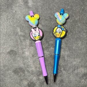 Daisy and Donald Duck pens
